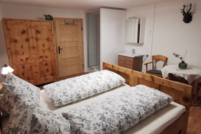 Gemütliche Betten in den Apartments am Bauernhof Lutzmannhof in der Steiermark